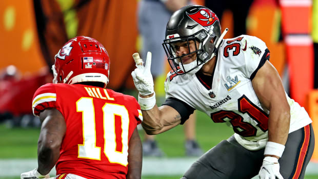 Feb 7, 2021; Tampa, FL, USA; Tampa Bay Buccaneers strong safety Antoine Winfield Jr. (31) taunts Kansas City Chiefs wide receiver Tyreek Hill (10) during the fourth quarter in Super Bowl LV at Raymond James Stadium. Mandatory Credit: Matthew Emmons-USA TODAY Sports